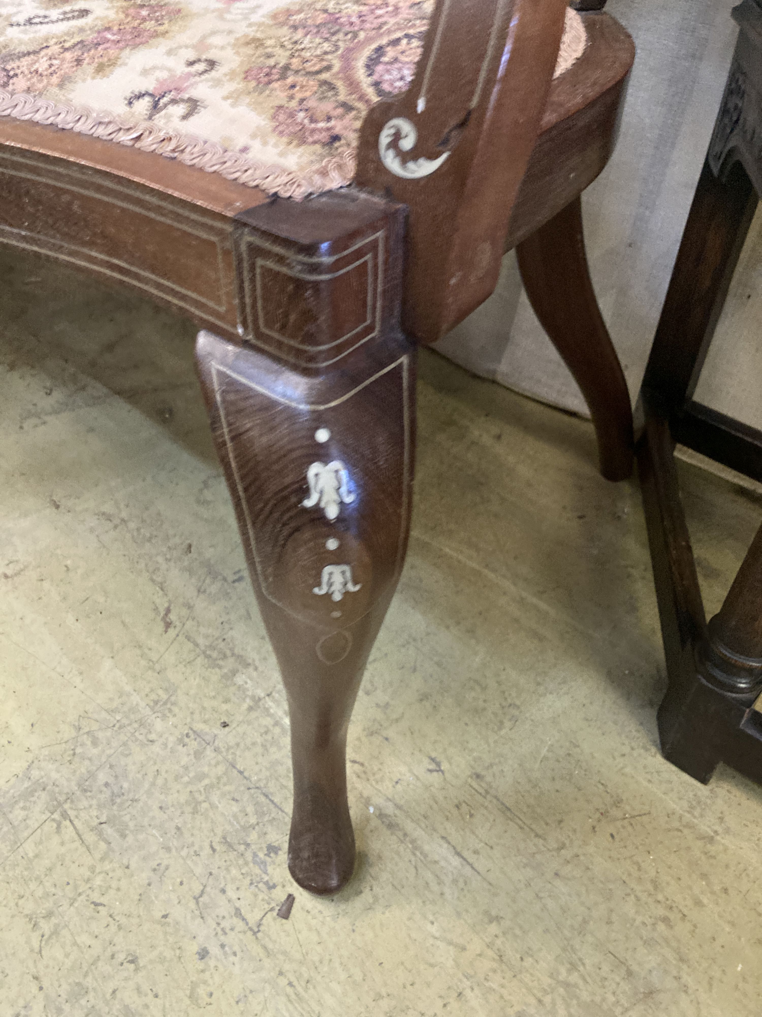 A pair of late Victorian inlaid mahogany elbow chairs, width 57cm, depth 46cm, height 87cm